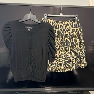 Skirt with matching sweater. Animal print